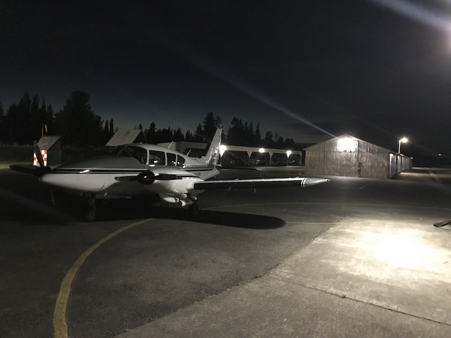 Piper Aztec at night.