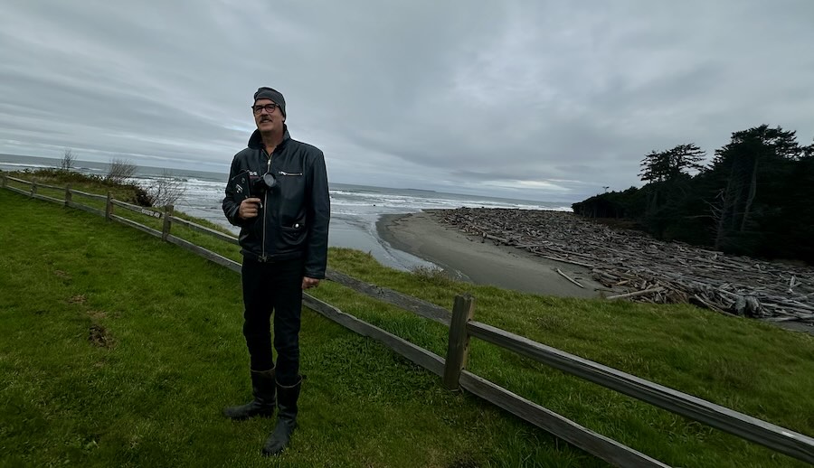 Krist with camera on bluff