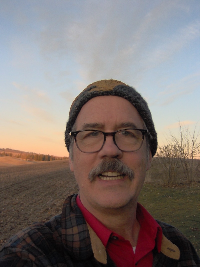 Krist on farm at dusk.